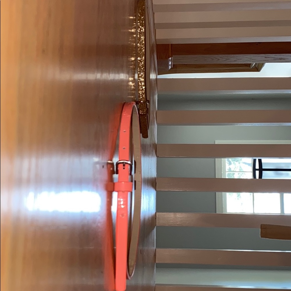 Glittery gold belt and hot pink belt
